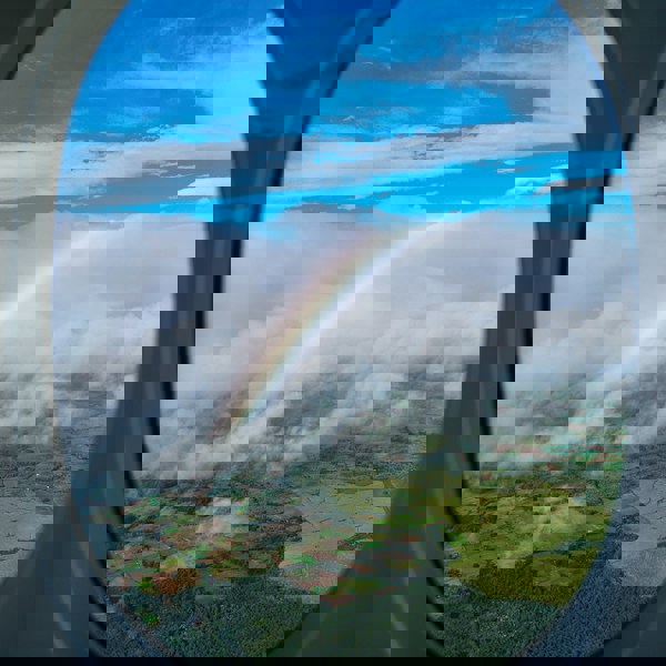 Mauritius gennem flyvindue med regnbue